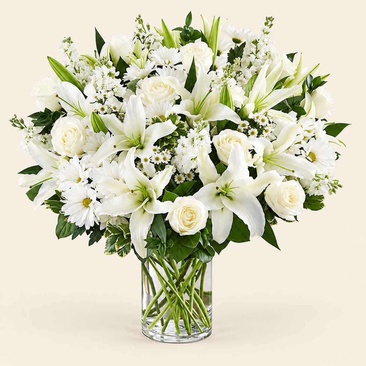 Close-up of white sympathy bouquet with lilies and roses from Baldwin Park florist