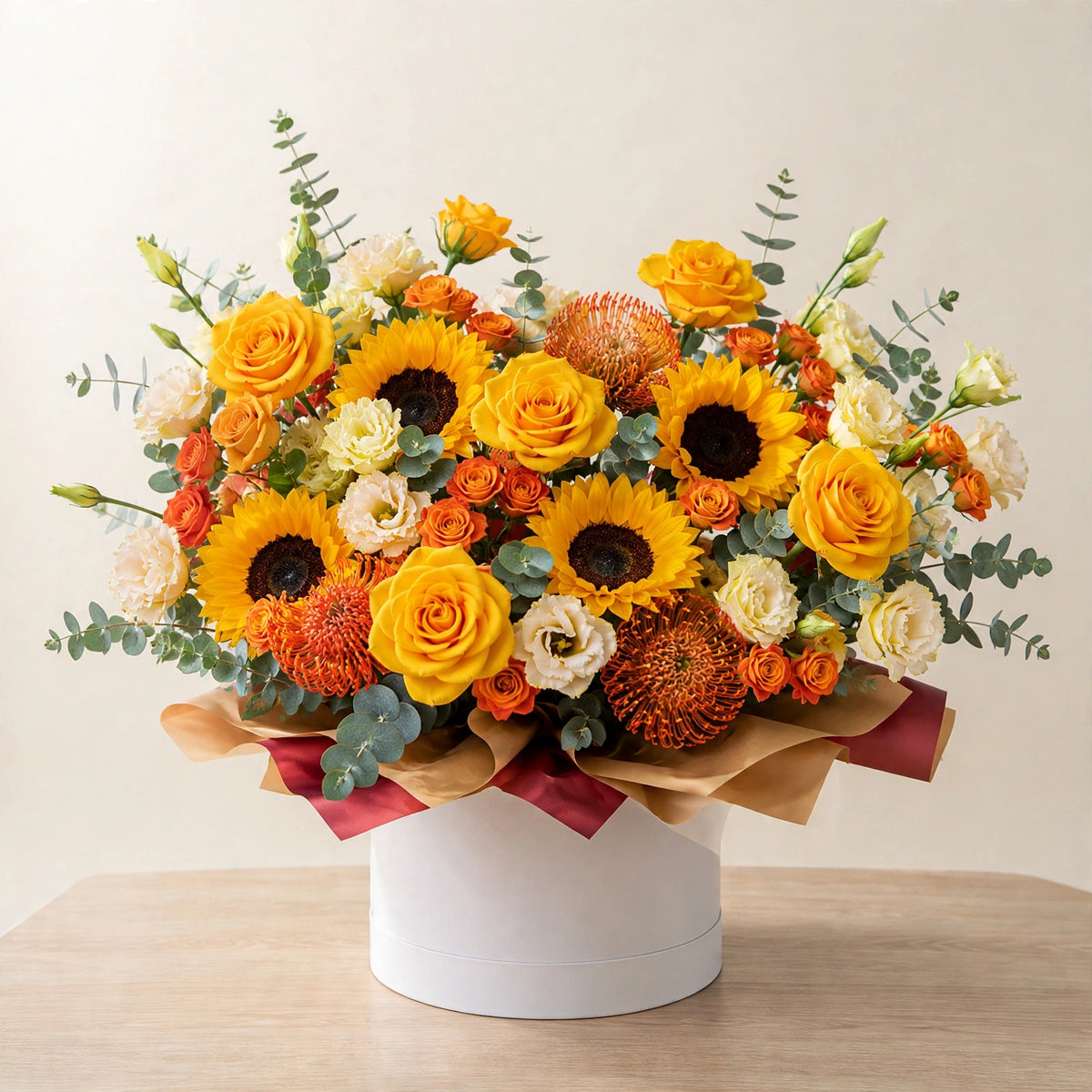 Golden Sunrise Box — sunflowers, golden roses, orange spray roses and pincushion protea in a white flower box, hand-arranged by LaLa Florist in Baldwin Park