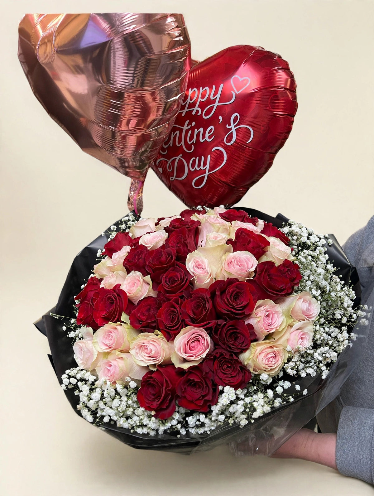 Roses Love Bouquet — red and pink roses hand-wrapped in black paper with heart-shaped balloons, by LaLa Florist in Baldwin Park, front view
