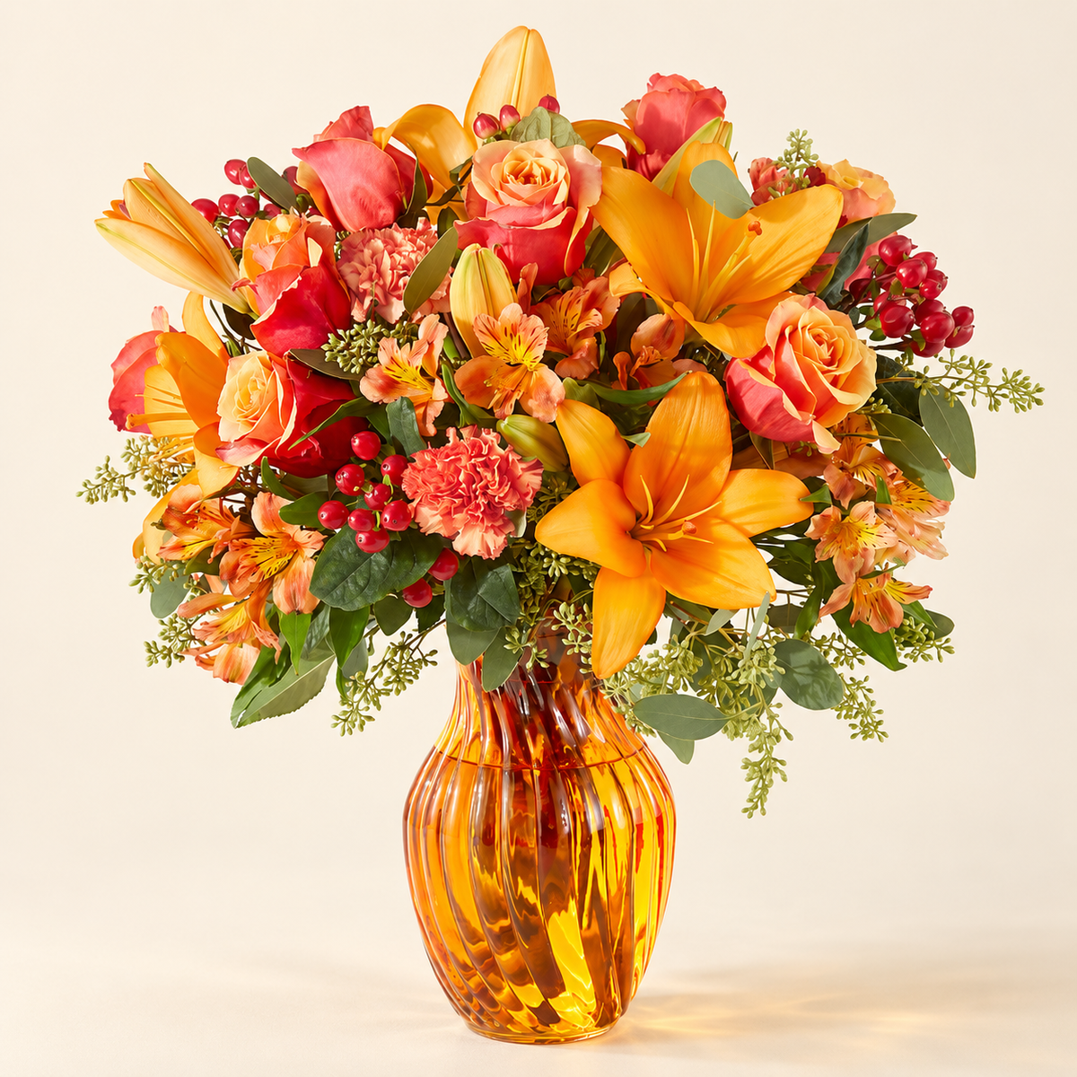 Close-up of fall bouquet with orange roses, lilies and alstroemeria from Baldwin Park florist