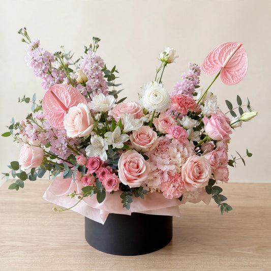 Blush Garden Box — blush pink roses and pink anthurium in a black flower box by LaLa Florist in Baldwin Park