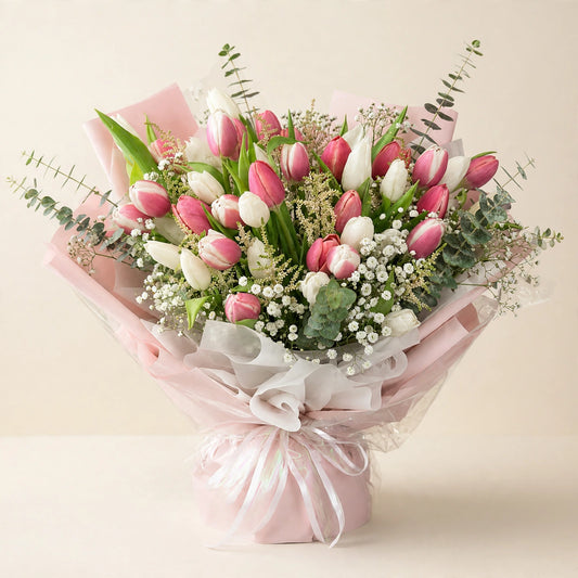 Blushing Tulip Garden Bouquet — pink and white tulips with baby's breath and eucalyptus, hand-wrapped by LaLa Florist in Baldwin Park