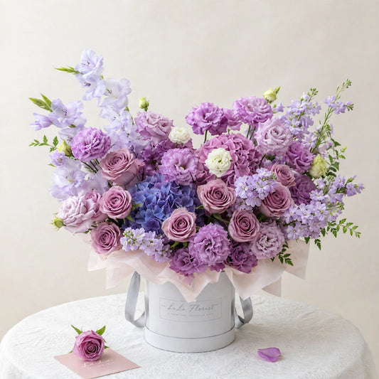 Royal Lavender Box — lavender roses, hydrangeas, lisianthus and stock in a flower box by LaLa Florist in Baldwin Park