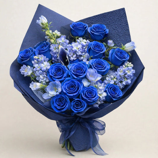 Blue Garden Rose Bouquet — fresh dyed blue roses with seasonal light-blue flowers in a dark-blue wrap, hand-tied by LaLa Florist in Baldwin Park