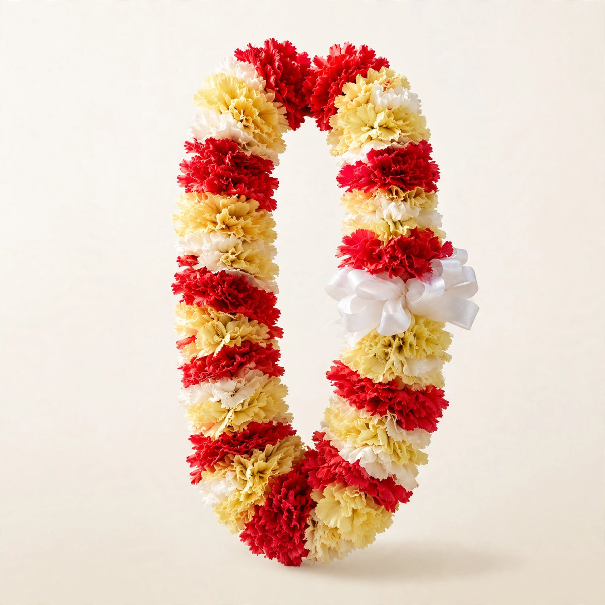 Carnation Graduation Lei — red, yellow and white fresh carnations hand-strung with a ribbon finish, handmade by LaLa Florist in Baldwin Park