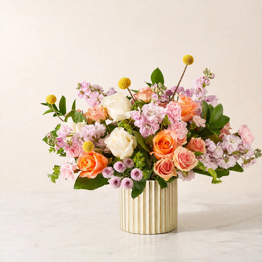 French Market Bouquet — soft pastel arrangement with blush, peach and ivory roses in a ceramic vase by LaLa Florist in Baldwin Park